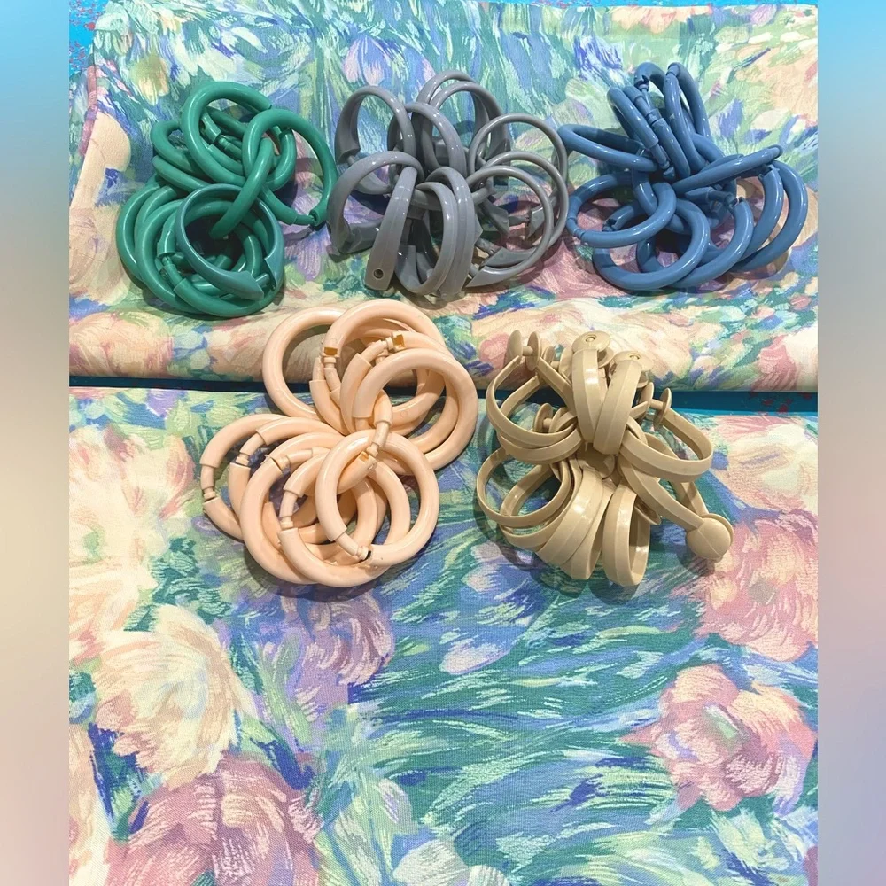 2 Floral Patterned Shower Curtains plus 5 sets of shower curtain hooks